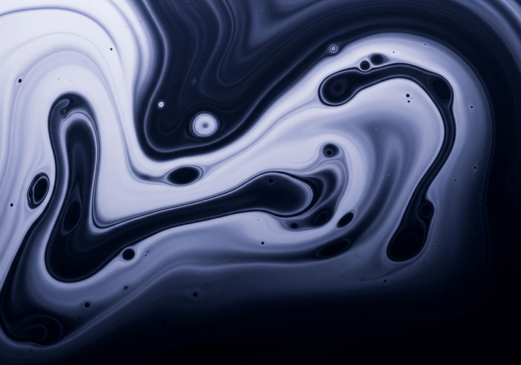 An AI-generated image of an abstract ink swirl in water